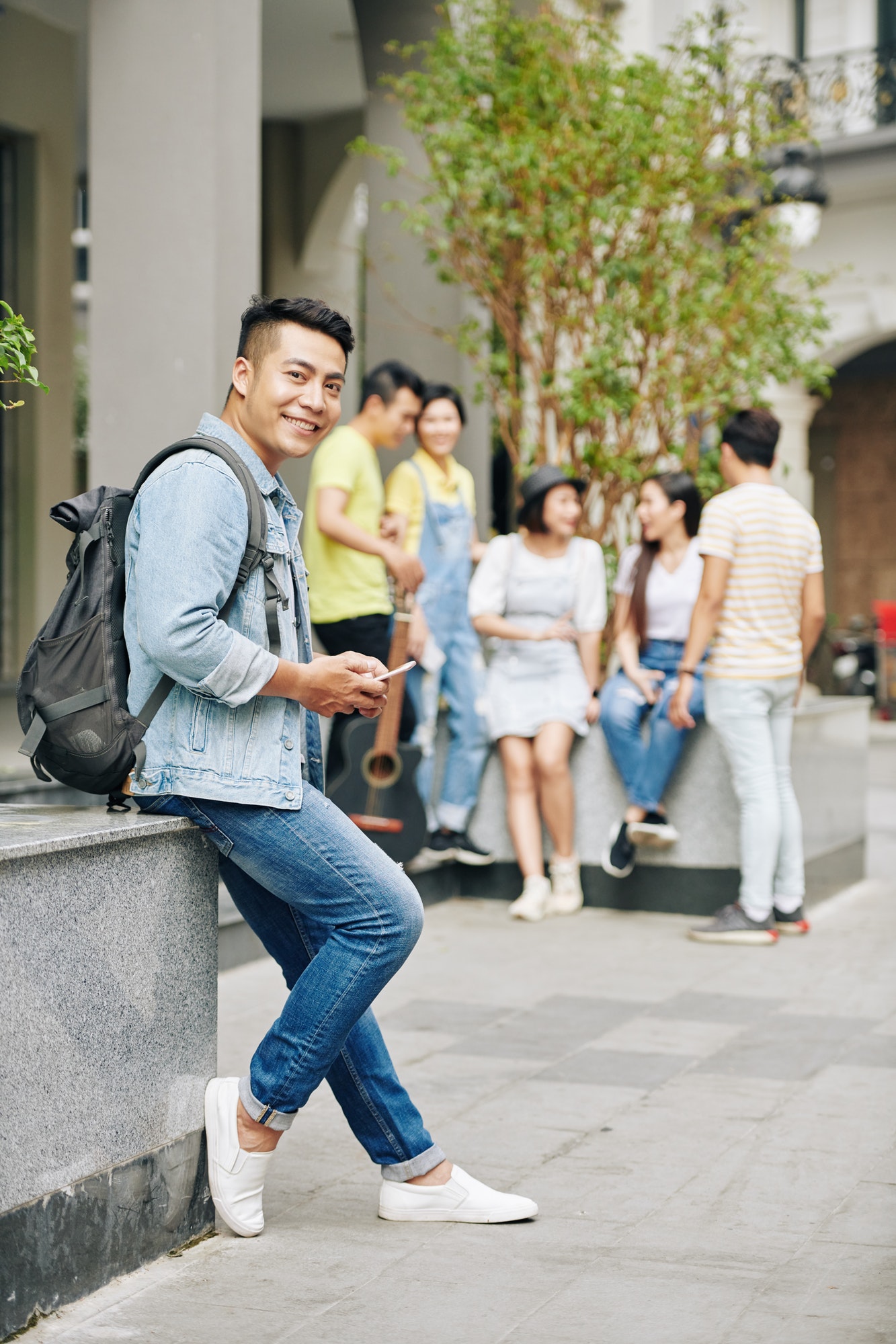 University student with smartphone